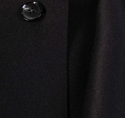 Cape avec bouton